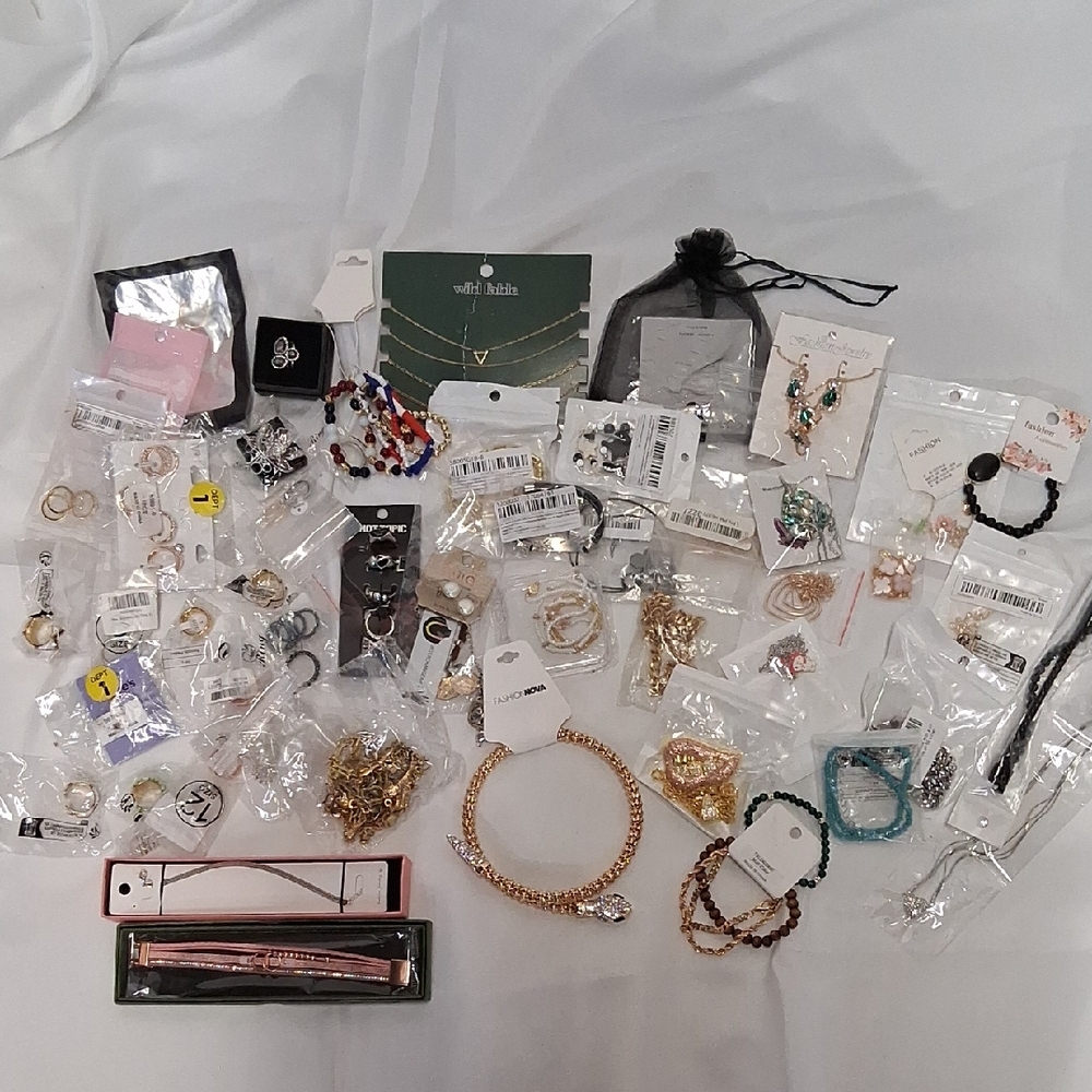 NWT Womens Over 50 Piece Jewerly Lot, Rings, Necklaces, & Bracelets